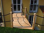 Holzbrücke Ansicht zum Haus